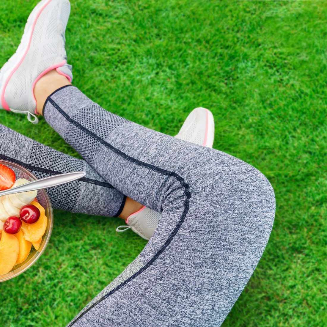 Young Girl Eating A Fruit Salad